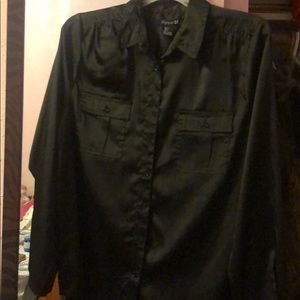 Silk button up shirt. Very classy.
